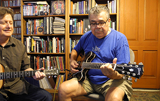 Photo of a blues guitar lesson.